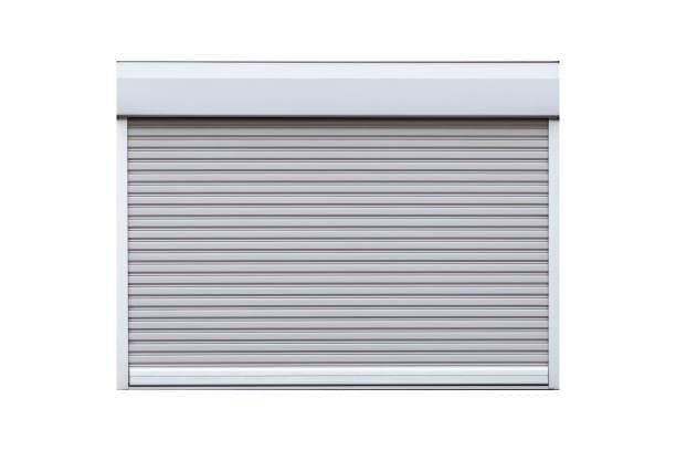Heavy-duty commercial rolling steel garage door installed on a warehouse loading bay
